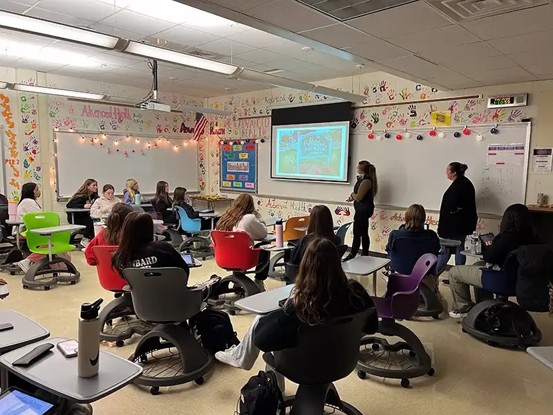 Veterinary professionals presenting to high school students in a classroom in Carol Stream